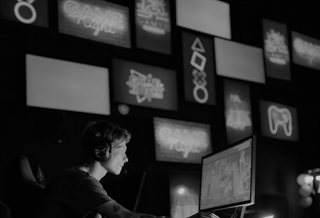 gamer sitting at a chair and computer