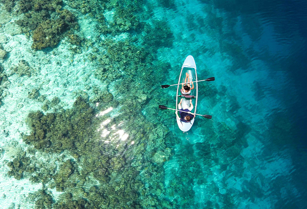 two people on a kayak in the Great Barrier Reef