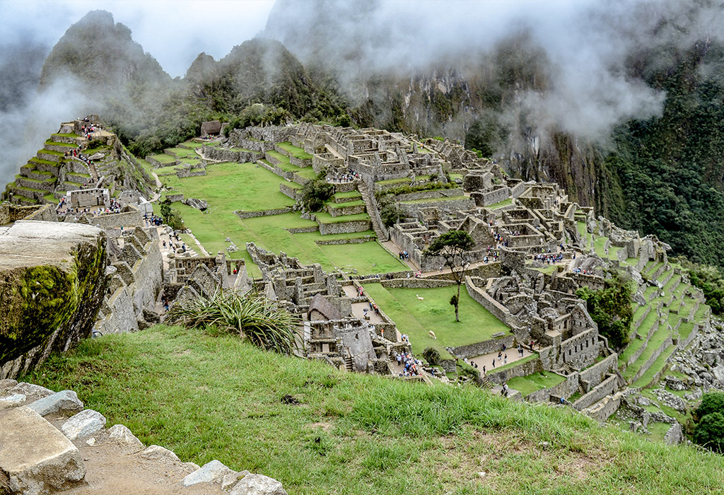 a midday photo of Machu Picchu
